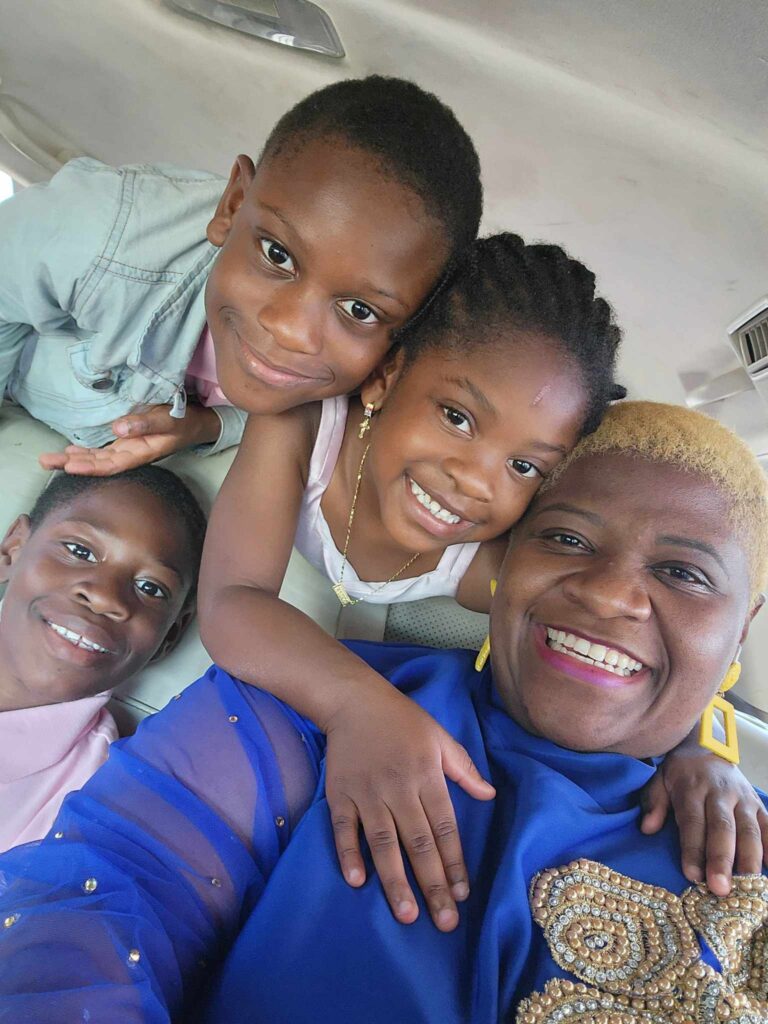 Travel nurse Evelyne Musaga with her kids