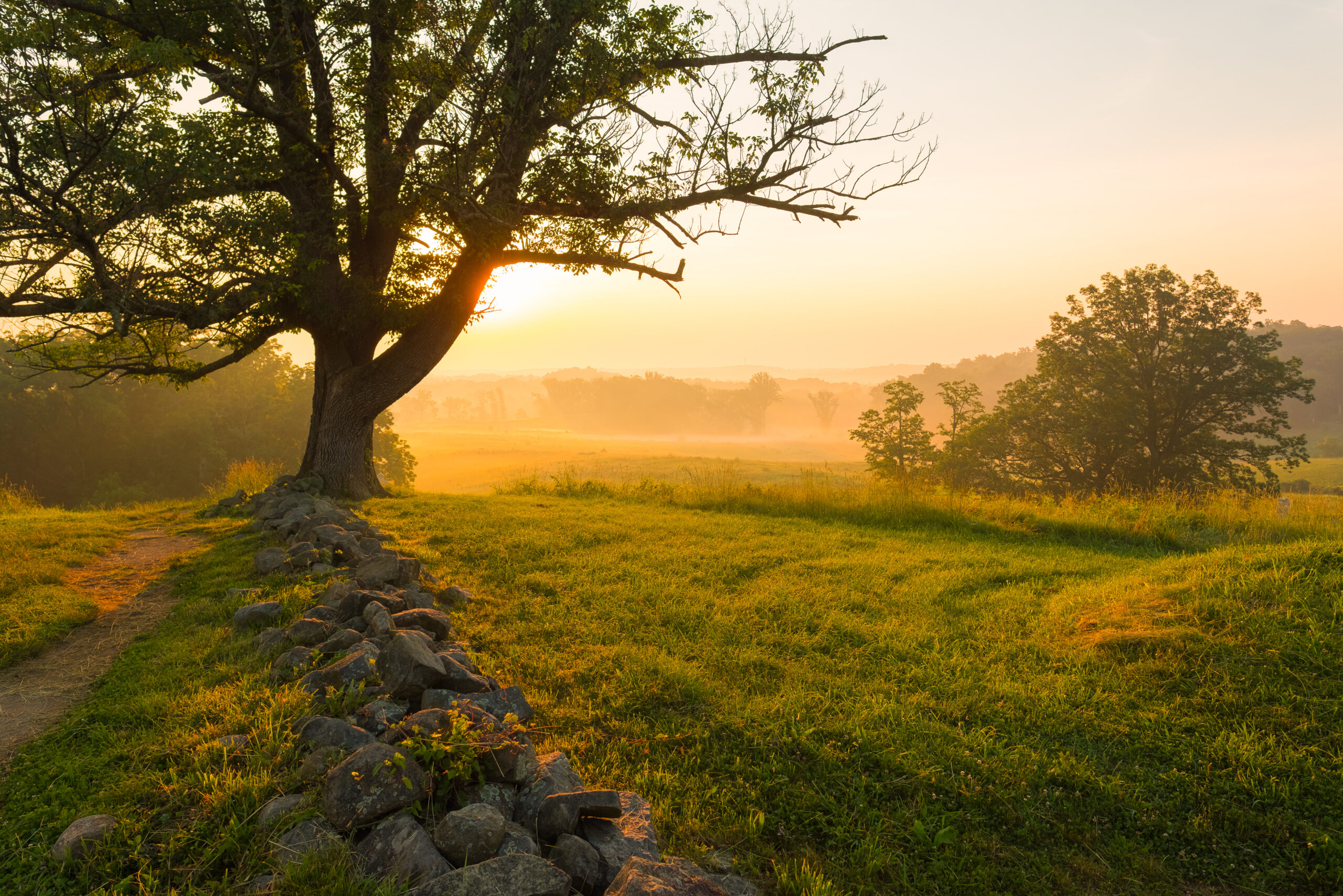 Travel Healthcare Jobs in Pennsylvania Foggy sunrise on East Cemetery Hill at Gettysburg National Military Park in Gettysburg, PA, USA.