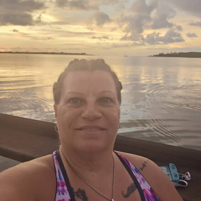 Cynthia Wilson, TRS Healthcare Nurse of the Year 2023 Cynthia Wilson, RN, with lake in the background